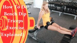 A woman exercising in a gym  -How To Do Bench Dip
